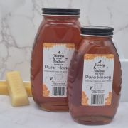 1 pound and 2 pound glass bottles of honey