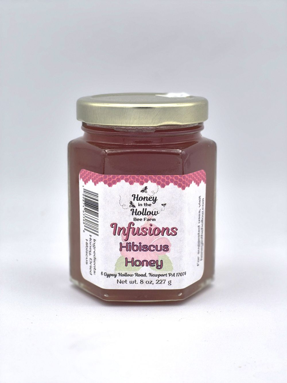 Hibiscus Infused Wildflower Honey 1 hibiscus infused wildflower honey in 8 ounce hex jar