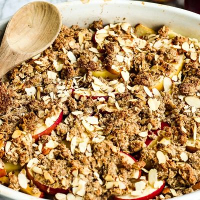 apple crisp in white stoneware casserole