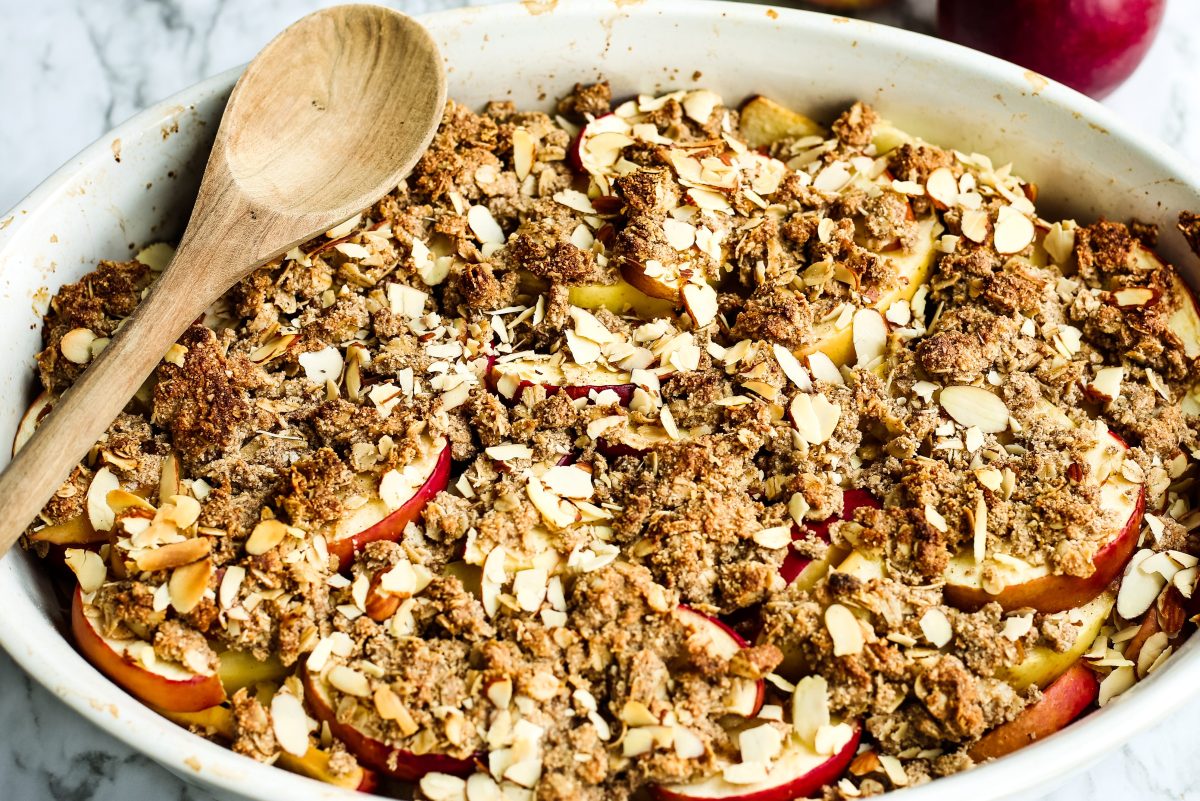 apple crisp in white stoneware casserole