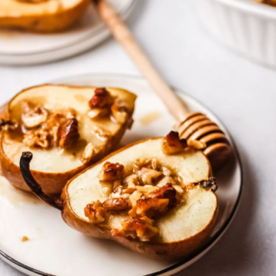 baked pears with nuts and honey on top