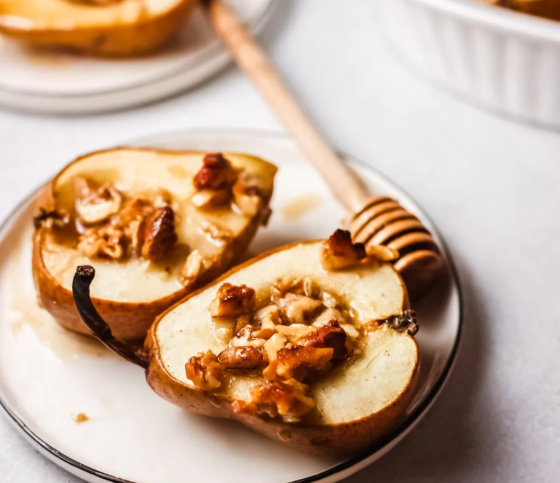 pears baked pears with nuts and honey on top
