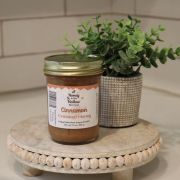 cinnamon creamed honey on platter with green plant