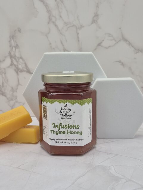 thyme infused honey in jar