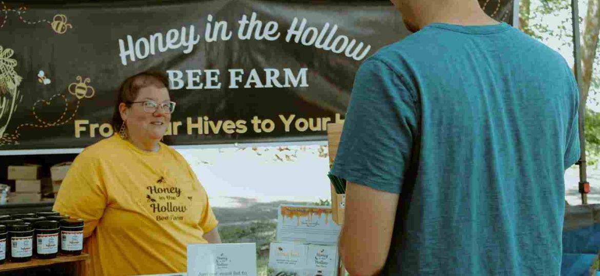 sue helping customer decide on the right honey